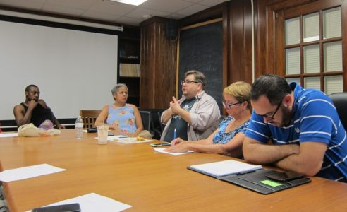 Williamsburg resident Carter McNeese (center) speaks during a meeting of supporters of Williamsburg's Black Lives Matter movement July 8, 2016. Travis Harris (far left) is the leader of the local movement (Kirsten Petersen/ WYDaily)