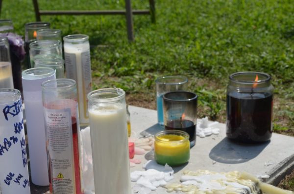 A memorial in front of 1094 Stewart Drive was created for Kameron Stanley, 18, who was shot to death Friday evening. (Kim Lenz/WYDaily)