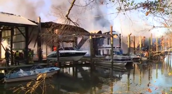 In a Facebook Live video stream, Henrico Fire Department is seen battling the blaze at the Richmond Yacht Basin on Friday morning. (Courtesy Facebook Live/WTVR)
