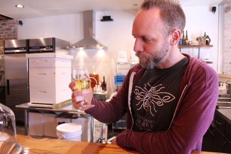 Glenn Lavender taste tests a mead at the Silver Hand Meadery Jan. 19. (Sarah Fearing/WYDaily)