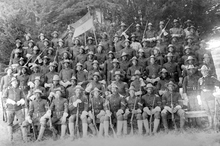 Officers and men also called "Buffalo Soldiers" of the U.S. Army's all-black 9th Calvary Regiment take a group photo prior to deploying from San Francisco to participate in combat operations in the Philippine-American War. (Courtesy U.S. Army Center of Military History)