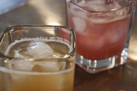 On the rocks or on tap, local brewers and distillers are getting creative with winter ingredients, like these pear- and grapefruit-infused cocktails at Copper Fox Distillery. (Steve Roberts/WYDaily)