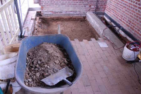 Archaeologists have begun excavating the northwest corner of the church. (Andrew Harris/WYDaily)