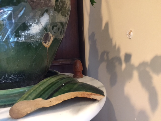 On April 20, two bullets struck Charles Wittges' home on the 4100 block of Winthrop Circle in Colonial Heritage, one hitting this planter. (Courtesy Charles Wittges)