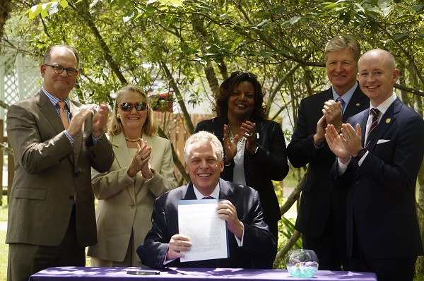 Gov. Terry McAuliffe signed legislation today proposed by Del. Mike Mullin (D-93) to get tougher on domestic violence. Pictured from left to right: Sen. Monty Mason, Del. Brenda Pogge, Gov. Terry McAuliffe, Glenda Turner, Secretary of Public Safety and Homeland Security Brian Moran, and Del. Mike Mullin.