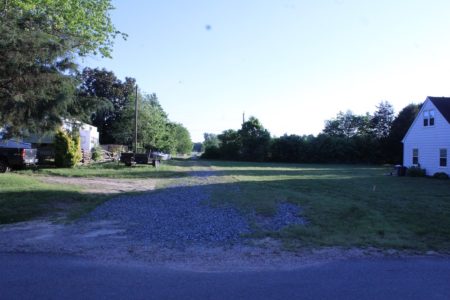 The dirt road between two homes on Oslo Court would be used by SunPower to access the solar farm. (Andrew Harris/WYDaily)