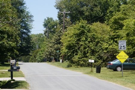 School bus stops line the streets of Indigo Park off John Tyler Highway in James City County. Residents say there are two reasons they moved into the neighborhood: there's not a homeowners association and the family character of the neighborhood. (Steve Roberts, Jr./WYDaily)