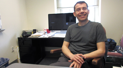 Andreas Stathopoulos describes his role in a neat quasi-palindrome: “I work in computer science and I specialize in scientific computing.” He and physicist Kostas Orginos are part of a collaboration to prepare to simulate big-data events on the next generation of supercomputing facilities. (Photo by Joseph McClain)