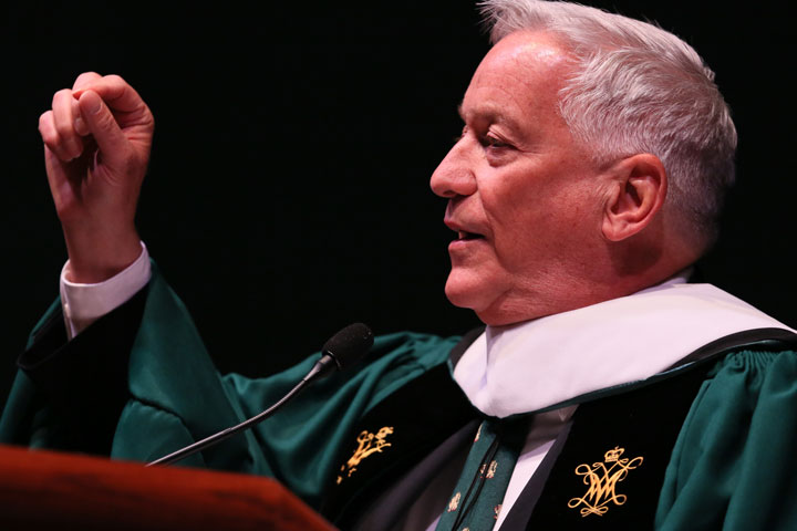 Walter Isaacson addresses W&M's Class of 2017 in Kaplan Arena Saturday morning. Photo by Stephen Salpukas