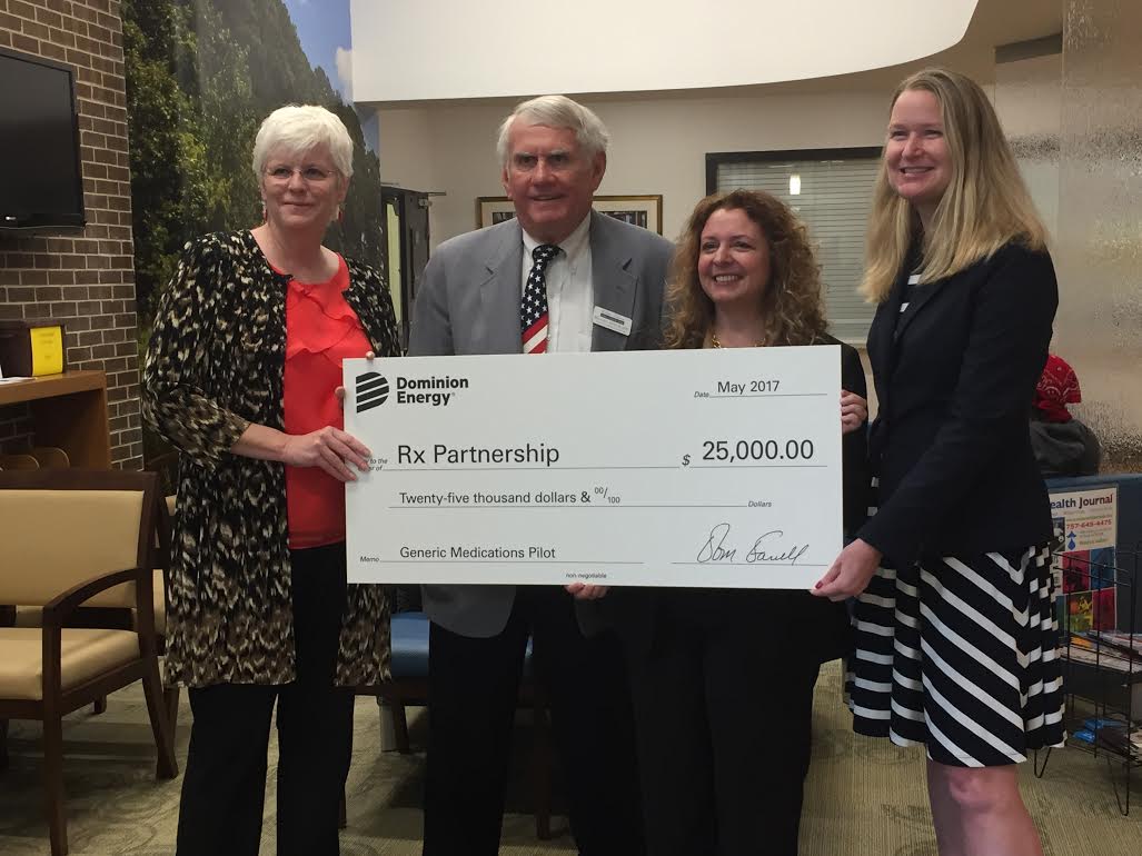 Superintendent Aaron Spence working with Virginia Beach students in a classroom. He is the highest paid employee at VBCPS. (Southside Daily file photo/Courtesy of Virginia Beach City Public Schools)