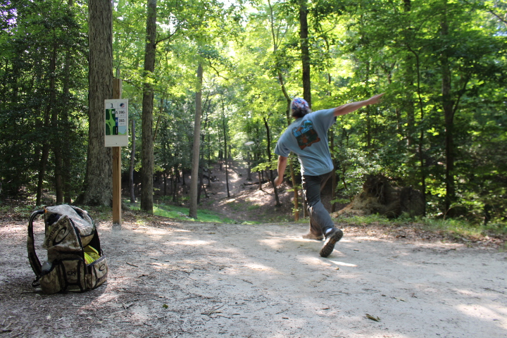 John Roy throws a disc during a round of disc golf at Waller Mill Park. Colonial Disc Golf Club President John Roy is also of a growing group of disc golf lovers populating the Peninsula. (Sarah Fearing/WYDaily)