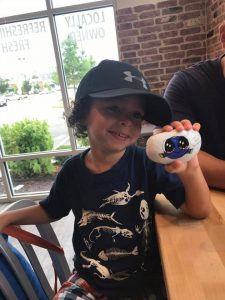 Rebekah Hernandez's son, found a "Dory rock" hidden by Kirstyn Kaely McArdle. Hernandez said her son may not let her rehide the rock, because he is a Dory fan. (Courtesy Rebekah Hernandez)
