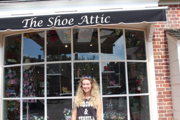 Brittany Rolston, 32, owns The Shoe Attic in Merchants Square. She handpicks the merchandise for The Shoe Attic and works to provide a family-oriented shopping environment. 