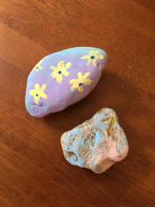 Amy Davies recently hosted a rock painting table at a Child Development Resources Fundraiser, which was hosted by David Nice Builders, a company her husband works for. She said she wrote instructions for the children and explained how rock hunting works. (Courtesy Amy Davies)
