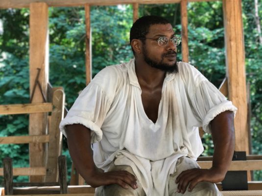 Ayinde Martin, 37 of Hampton, has worked as a journeyman carpenter in Colonial Williamsburg for nearly a decade, and rarely do visitors ask him the questions he wants them to ask. (Steve Roberts, Jr./WYDaily.com)