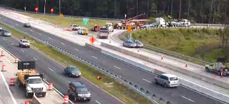 An overturned tractor trailer snarled traffic on I-64 West Wednesday morning. (Courtesy VDOT)