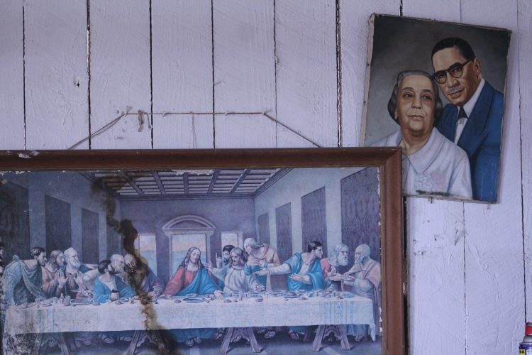 Leonardo Da Vinci's painting, "The Last Supper," hangs on the wall of the barn alongside a portrait of Elder Michaux and his wife, Mary Eliza Pauline. (Iris Hyon/WYDaily)