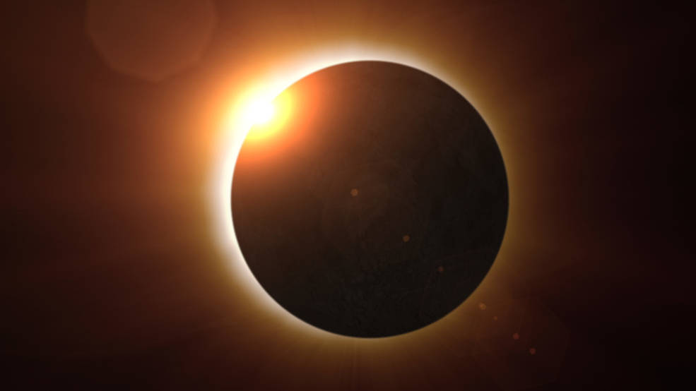 This illustration depicts a rare alignment of the Sun and Moon casting a shadow on Earth. (Courtesy NASA)
