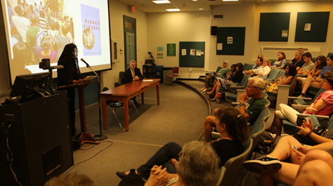 Hermine Pinson, a professor of English and Africana studies and a member of the 50th anniversary committee, speaks to students and family members during a panel discussion on the 2017 common book, "Hidden Figures." (Photo by Stephen Salpukas)