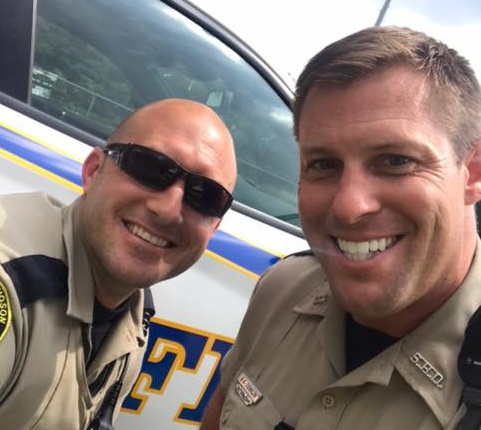 Deputy Brett Schultz (left) and Deputy George Conklin posed for a selfie as part of the national #HotCops trend Friday. (Courtesy York-Poquoson Sheriff’s Office)