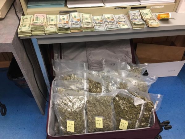 Williamsburg Police say they found this suitcase full of marijuana and drugs at Bryant's resident, the release said. (Photo courtesy of Williamsburg Police Department)