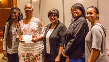 (From left) Hermine Pinson, Trudier Harris, Jacqui McLendon, Chon Glover and Leah Glenn pose for a photo together after the members of the 50th anniversary committee presented Harris with an award in recognition of her role as the first tenured African-American at W&M. Photo courtesy of Chon Glover