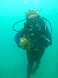 Dr. Emily Rivest retrieves a pH sensor full of data from a reef in Taiwan. Photo courtesy of Apple Chui.