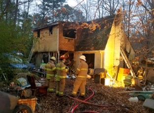 A James City County house sustained extensive damage after it caught fire Wednesday afternoon. (Courtesy photo/James City County)