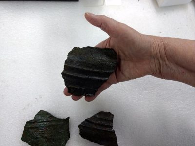 Three of the bell fragments. (Andrew Harris/WYDaily)