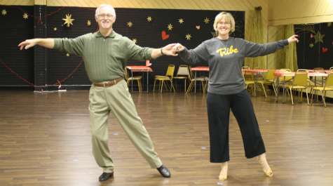 Ginger Ambler, vice president for student affairs at William & Mary, was one of the contestants in the annual Dancing with the Williamsburg Stars competition in 2013. A first-time participant, Ambler practiced with Rick Zilonka, a master ballroom dance instructor. (Courtesy photo/William & Mary News)