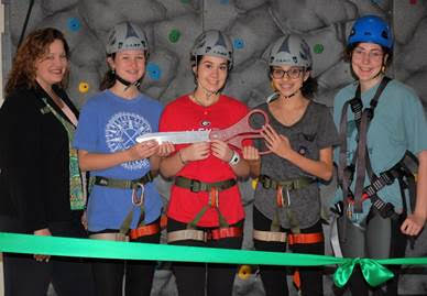 Girl Scouts of the Colonial Coast CEO Tracy Keller with Girl Scouts Laine Ingham, Maddie DeCandido, Alexis Martin and climbing wall facilitator Elizabeth Ramsland had the honor of cutting the ribbon at the climbing wall dedication.