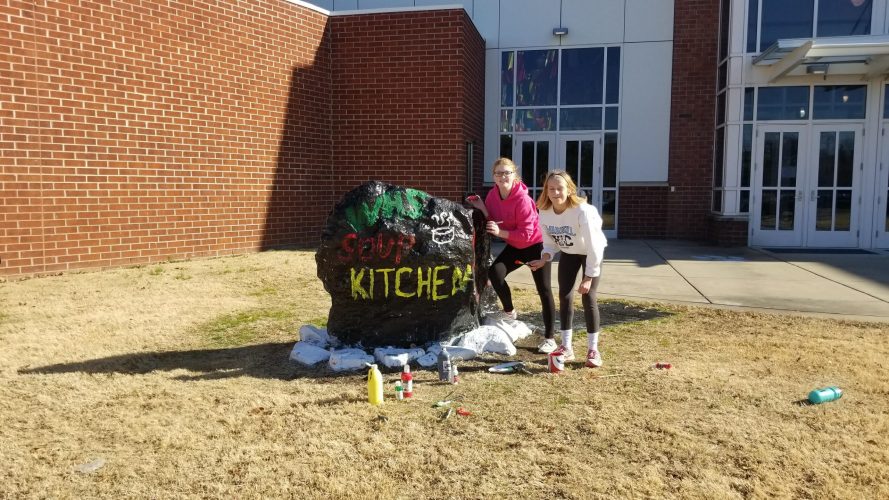 Warhill SCA members Martina Watson and Sabrina Christofferson helped to organize the first holiday soup kitchen at the high school. (Chandler McKnight)