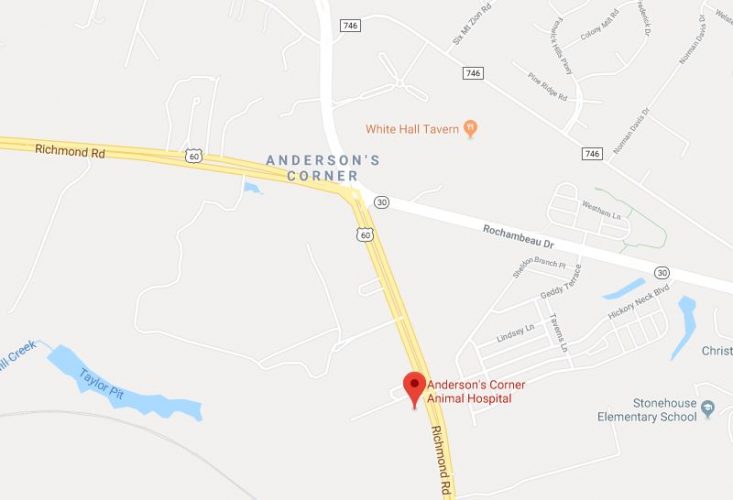 A James City County firefighter is charged with reckless driving after police say he failed to obey a red light while driving a fire engine, causing a crash with a septic truck and injuring four people. (Courtesy photo/Google Maps)