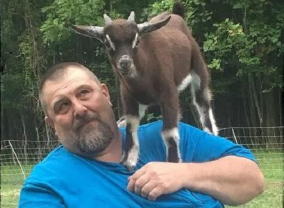 Rick Stewart with one of his goats. (Courtesy photo/Commonwealth Goatworx)