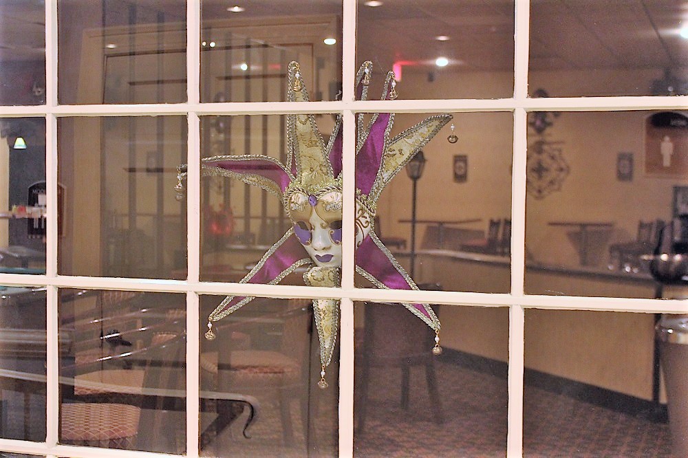 Window decorations inside the Cozy Patio Bistro, which reopened in the Clarion Hotel. (Andrew Harris/WYDaily)