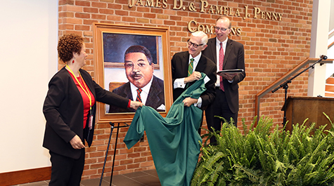 Edwadine Travis Whitehead, President Taylor Reveley and Dean Davison M. Douglas started off the 2018 African-American Law Alumni Celebration with the unveiling of the portrait of Edward Augustus Travis B.C.L. '54, the first African-American graduate of William & Mary Law School. (Courtesy photo/David F. Morrill)