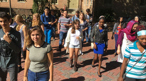 Students in William & Mary music Professor Anne Rasmussen's freshman seminar class American Soundscapes: Music, Migration and Resettlement as part of the Sharpe Community Scholars program last fall hosted local refugees for a tour of campus. (Photo courtesy of Anne Rasmussen)