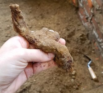 Archaeologists uncovered a dagger hilt in the cellar in the Jamestown church. (WYDaily/ Courtesy Mary Anna Hartley, Jamestown Rediscovery)