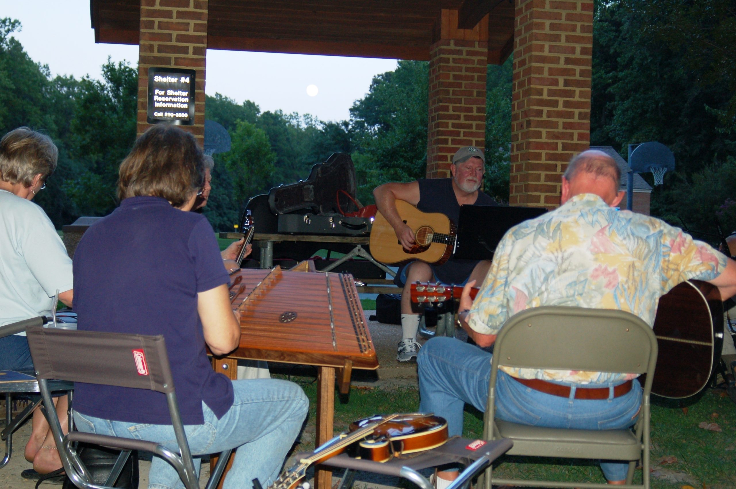 Local music lovers join Joe Duggan for round-robin acoustic music jams at New Quarter Park. (WYDaily/Courtesy of York County)