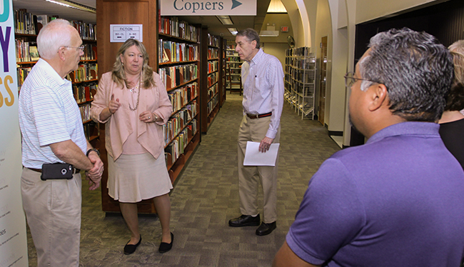 Williamsburg Regional Library Director Betsy Fowler leads members of the board of trustees on a tour of the library at 515 Scotland St. (Bryan DeVasher/WYDaily)