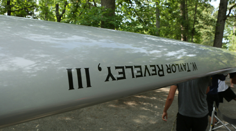 Members of the W&M rowing club walk the W. Taylor Reveley III shell down to the Chickahominy River on Monday. The outgoing president attended the surprise naming ceremony. (WYDaily/Courtesy of Stephen Salpukas)