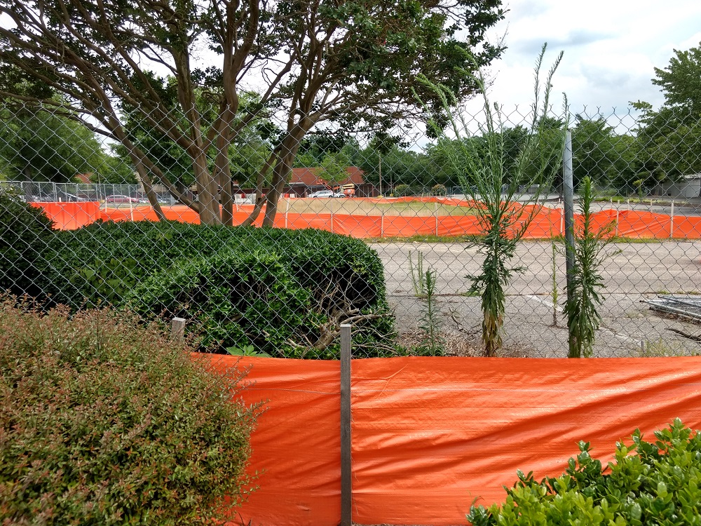 Parking in front of Marshalls has been fenced off for upcoming construction on Midtown Row. (WYDaily/ Andrew Harris)