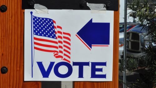 Photo of a sign indicating where to vote