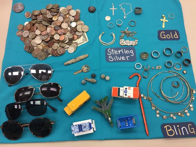 HRRS member Jim Street of Yorktown showcased a month’s worth of finds at a club meeting in July. Street has been hunting at beaches for 30-some years. (Alison Johnson/HNNDaily)