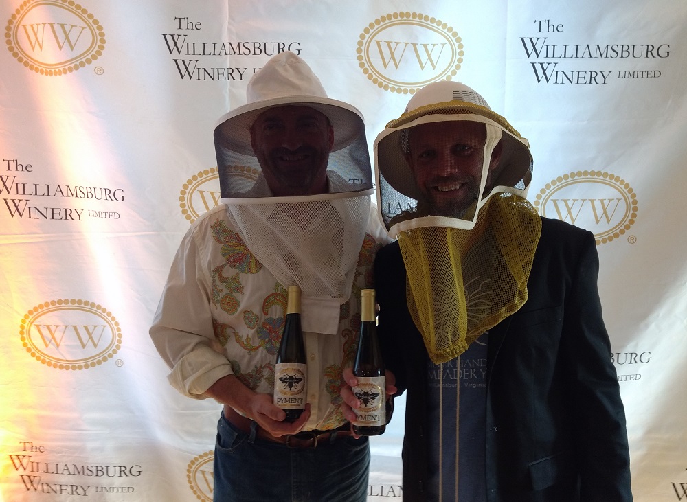 Matthew Meyer (left) and Glenn Lavender wearing beekeepers masks at the Williamsburg Winery June 12 at "Two is Better Than One" pyment debut. (WYDaily/Andrew Harris)