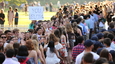 On the first day of classes, faculty, staff and students gather at the Sir Christopher Wren Building to signify the beginning of the academic year and to officially welcome all of our entering William & Mary students. At the conclusion of the ceremony each year, the official party leads those in attendance around the building to the opposite side. According to our tradition, all students who are new to W&M remain at the ceremony site with the university President. Then, at the tolling of the Wren Building bell, the President leads the group in a special procession through the portico of the building to the other side, where the new students are warmly welcomed by current members of the faculty, staff and student body. A festive campus-wide picnic dinner follows for the entire campus community. Not unlike the Commencement exercises which mark the close of an academic session, this ceremony is a time of affirming and enhancing the sense of community which exists at William & Mary. It is a time of achieving focus, of highlighting themes we know to be important to our current condition, and of reaffirming those things we value and share. We welcome you to join us each fall as we honor our newest William & Mary students! (WYDaily/Courtesy Stephen Salpukas)