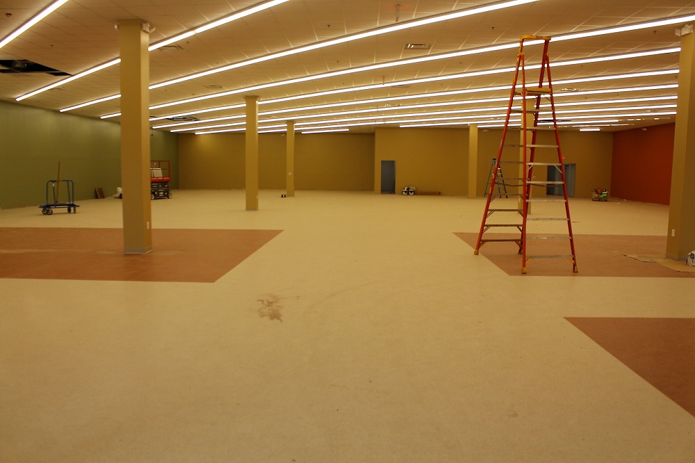 The view from the entrance of Ace Hardware's new store, which will open this fall. Construction crews are putting on the finishing touches before shelves are installed and inventory is delivered. (WYDaily/Andrew Harris)