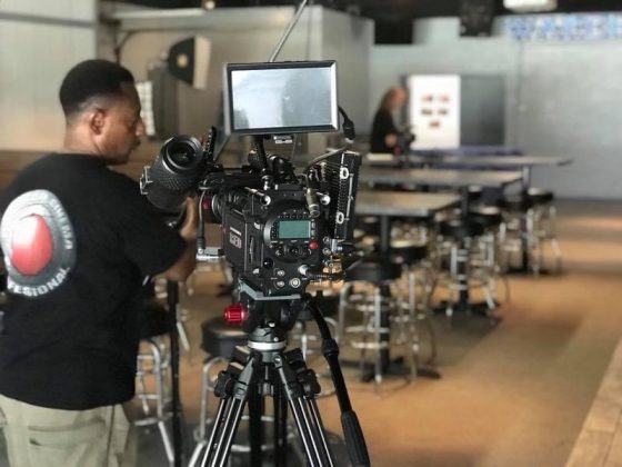 Virginia Peninsula residents Gordy Price and James Person have produced a fictional film based on stories about Crawford Road, Yorktown, and the unsolved Colonial Parkway murders in the late 1980s. Here, Person operates film equipment during the making of "Crawford Road." (WYDaily/Courtesy James Person)
