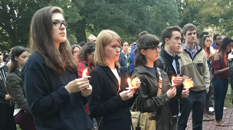Students listen to the speakers during Monday night's candlelight vigil. (WYDaily/Courtesy Erin Zagursky