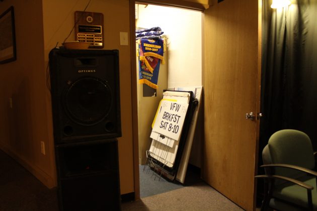 A sign advertising a public breakfast at the VFW sits in a closet. The VFW is working to gain younger members. (WYDaily/Sarah Fearing)